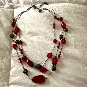 Necklace with three layers of stones.  Also have matching earrings